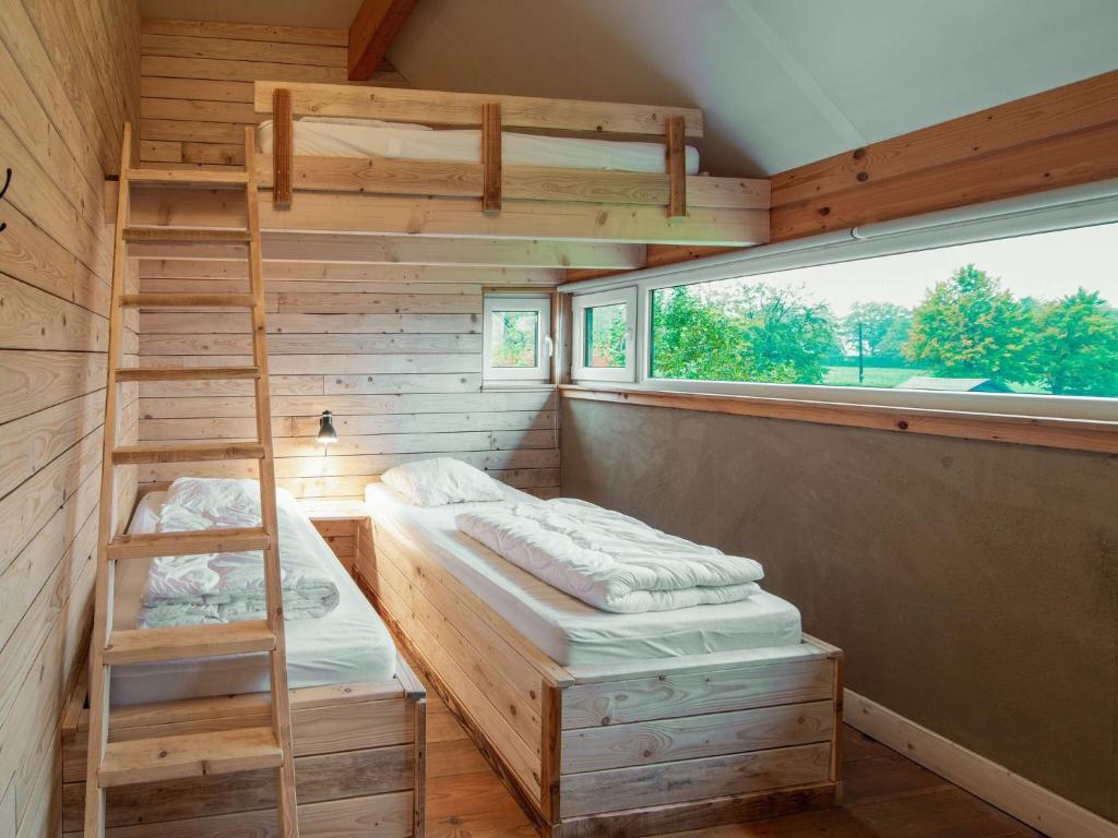 Postel nebo postele na pokoji v ubytování Holiday Home High Fens near Ski Lift