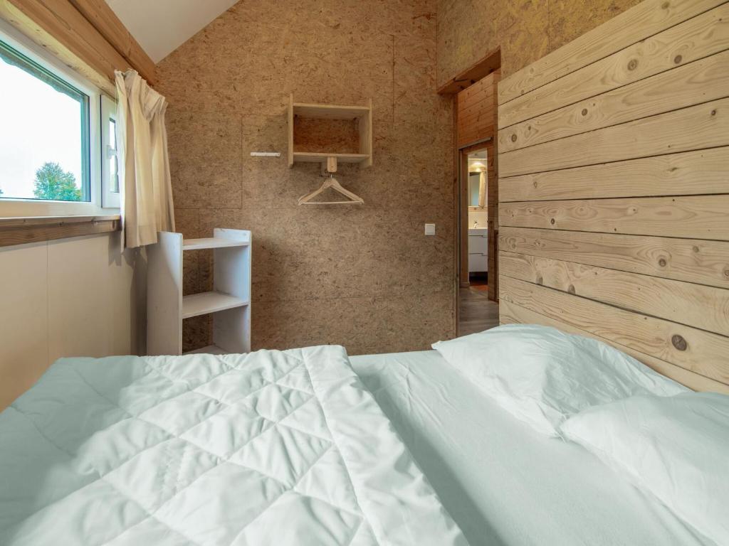Postel nebo postele na pokoji v ubytování Holiday Home High Fens near Ski Lift