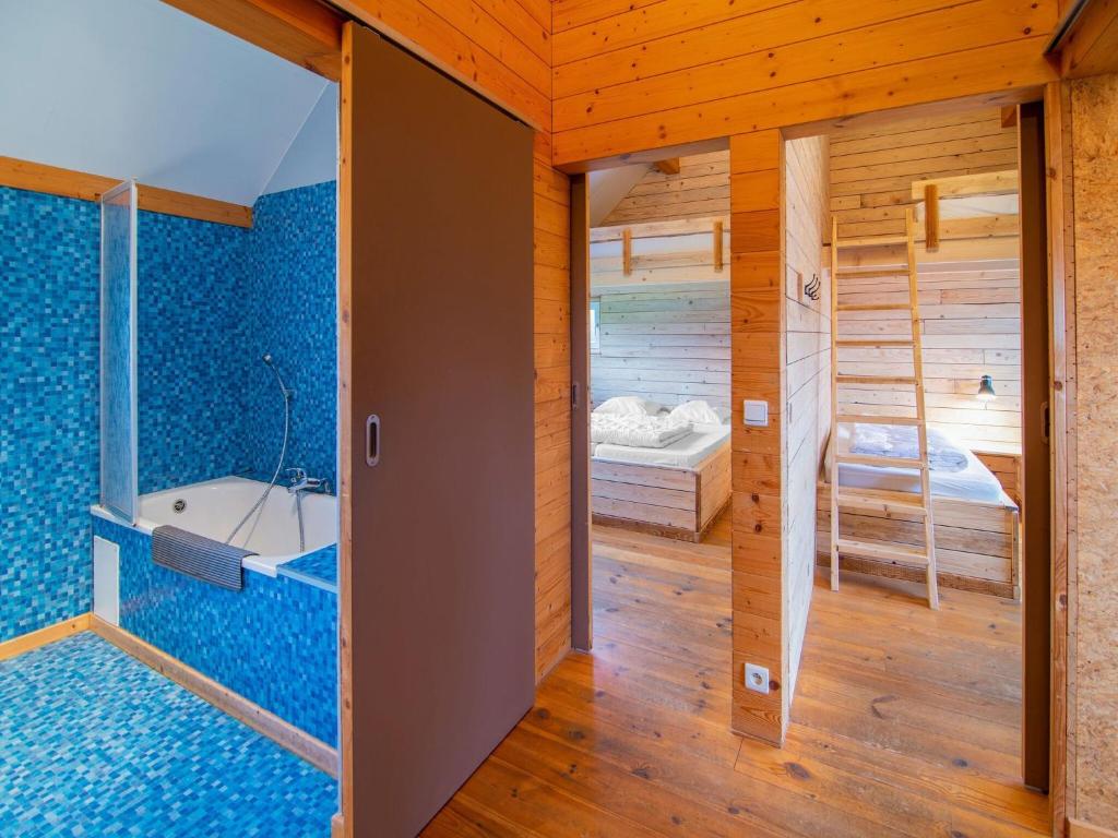 Postel nebo postele na pokoji v ubytování Holiday Home High Fens near Ski Lift
