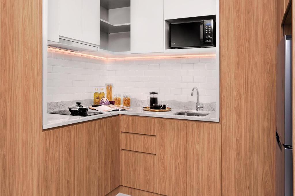 Kuchyň nebo kuchyňský kout v ubytování Citadines Sudirman Jakarta