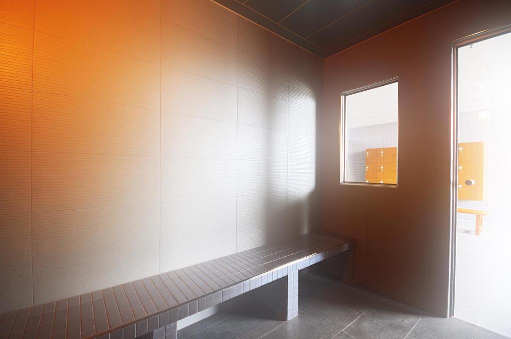 Postel nebo postele na pokoji v ubytování Yaling Hotel