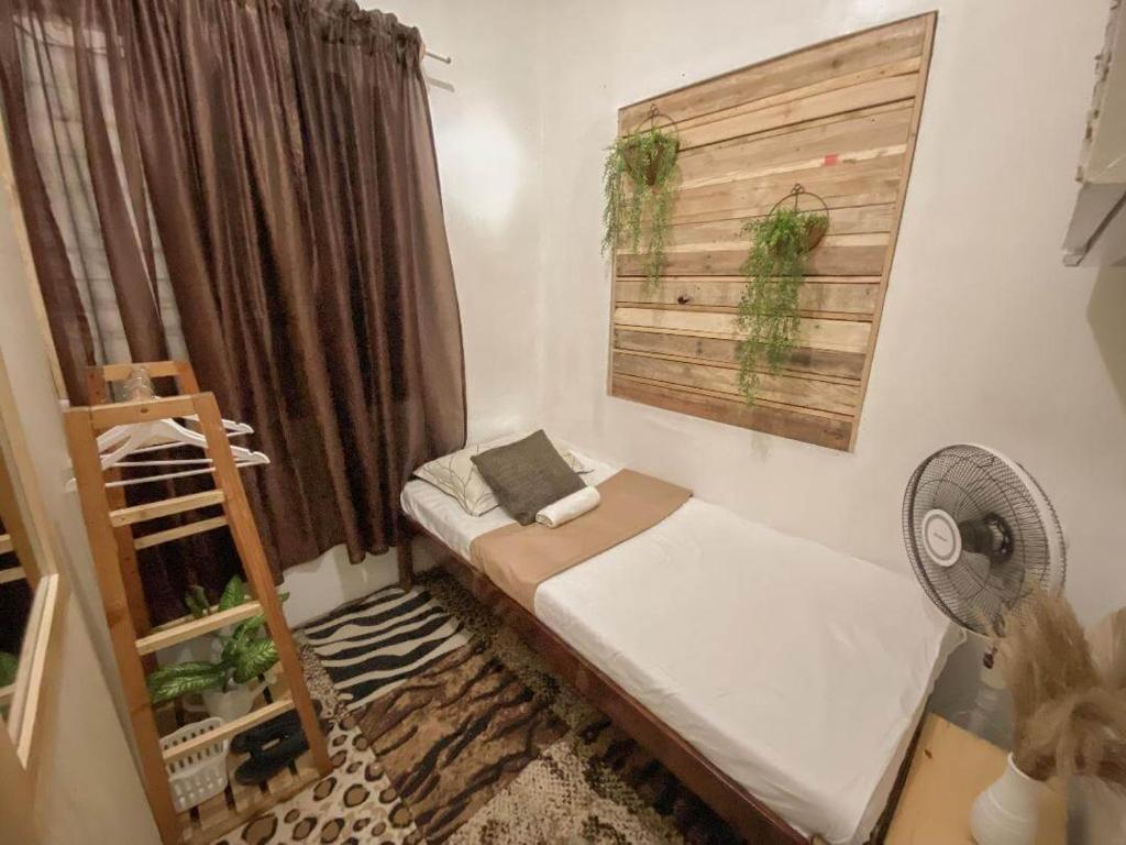 Postel nebo postele na pokoji v ubytování Pallet Homes - Tabuc Suba