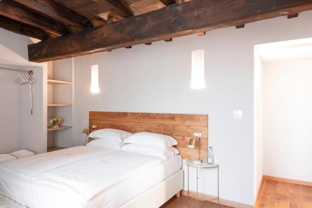 Postel nebo postele na pokoji v ubytování Corte Alma Spa and Luxury Home