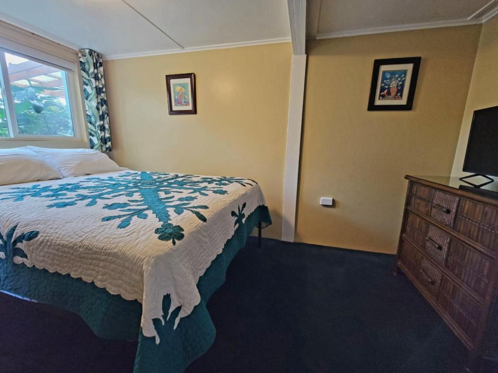 Voodi või voodid majutusasutuse Wailuku Guesthouse toas