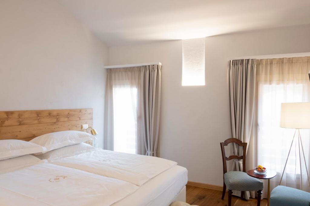 Postel nebo postele na pokoji v ubytování Corte Alma Spa and Luxury Home
