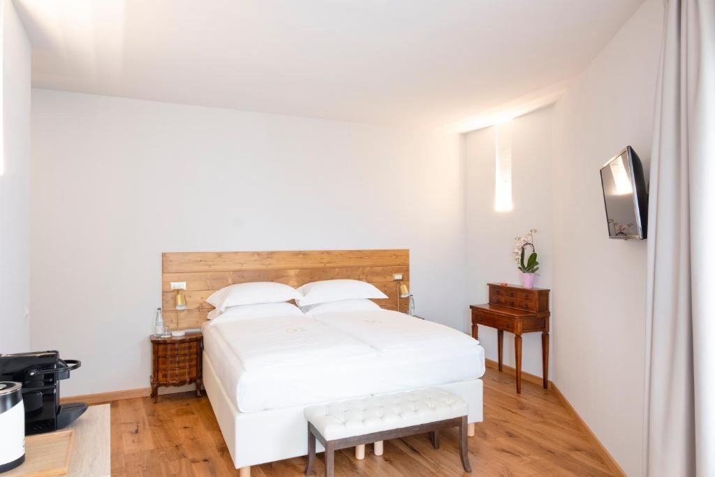 Postel nebo postele na pokoji v ubytování Corte Alma Spa and Luxury Home