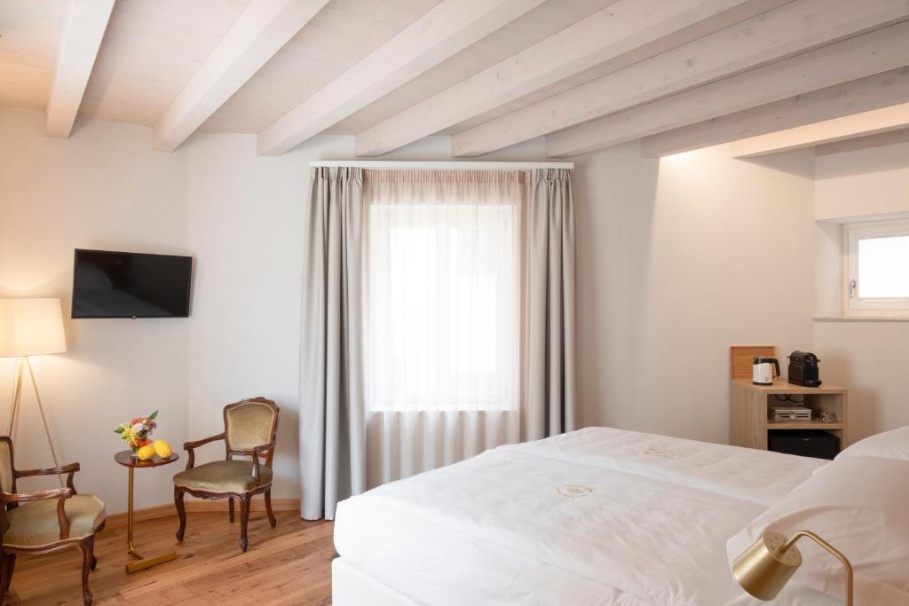 Postel nebo postele na pokoji v ubytování Corte Alma Spa and Luxury Home