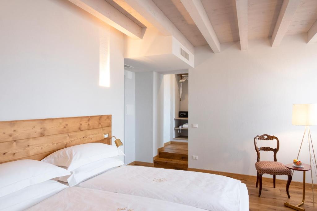 Postel nebo postele na pokoji v ubytování Corte Alma Spa and Luxury Home