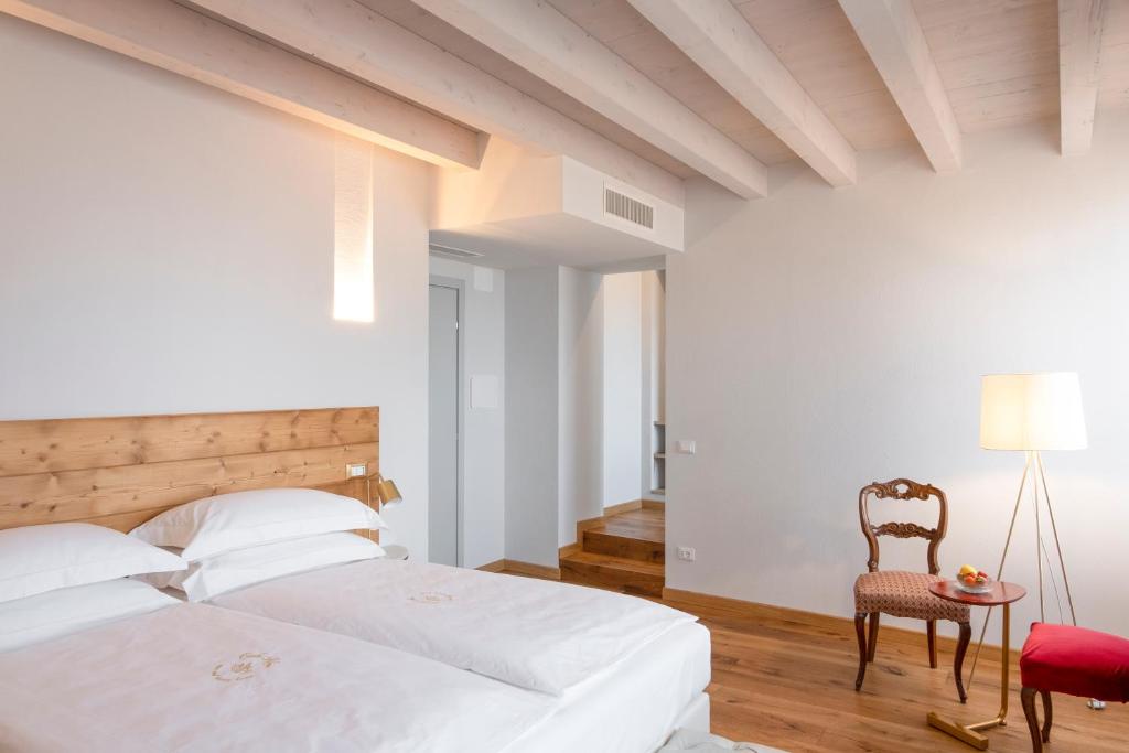 Postel nebo postele na pokoji v ubytování Corte Alma Spa and Luxury Home