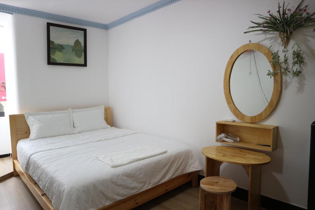 Voodi või voodid majutusasutuse Loan Võ hostel toas