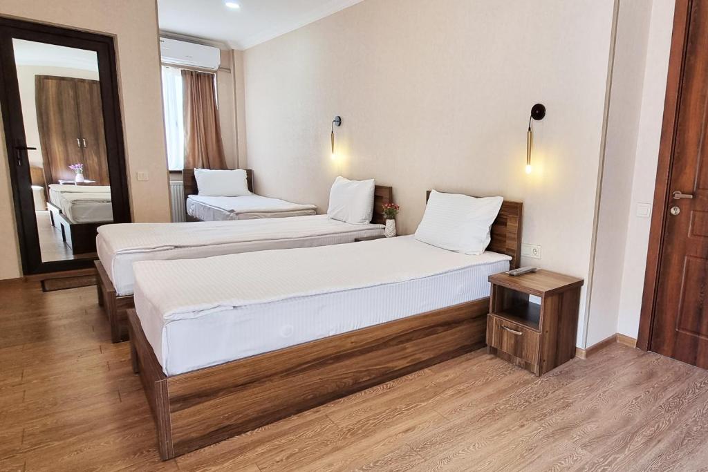 Sina Hotel - Driepersoonskamer