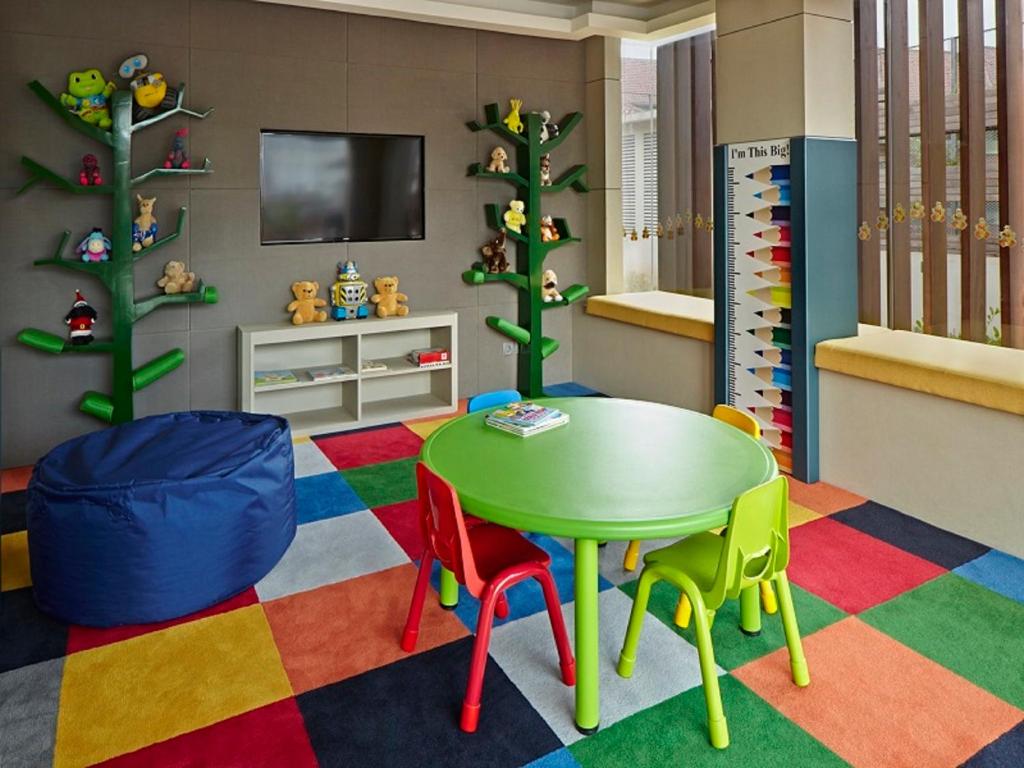 TV a/nebo společenská místnost v ubytování Fraser Residence Menteng Jakarta