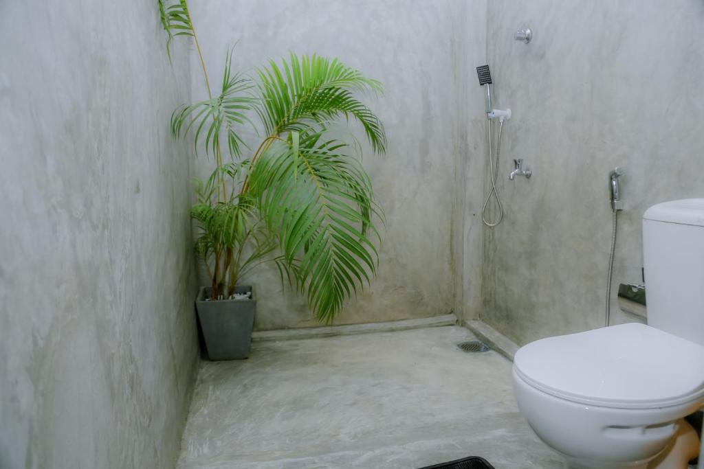 Koupelna v ubytování Ruwan Jungle Homestay