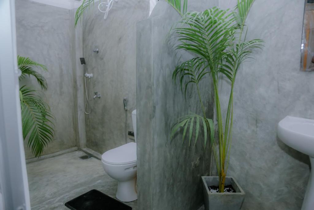 Koupelna v ubytování Ruwan Jungle Homestay