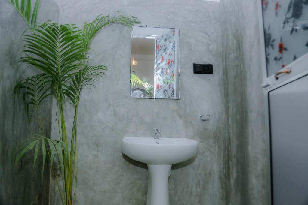 Koupelna v ubytování Ruwan Jungle Homestay