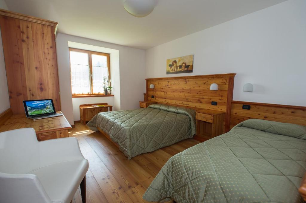 Postel nebo postele na pokoji v ubytování Casa Tomaselli