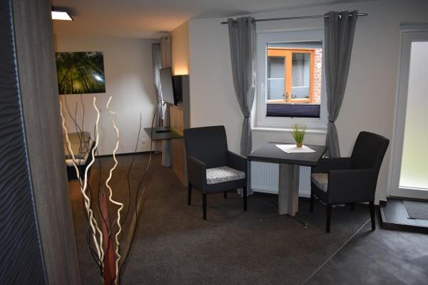 TV a/nebo společenská místnost v ubytování Hotel Neue Stuben