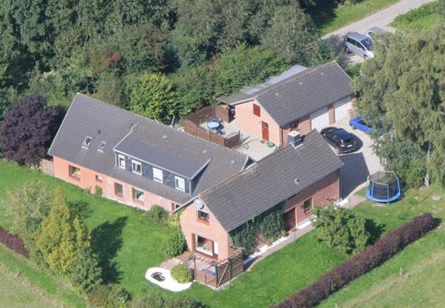 an aerial view of a large house with a driveway at Ferienhof Jepsen in Westerholz