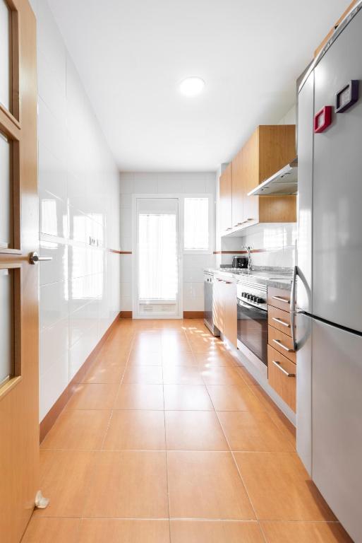 Kuchnia lub aneks kuchenny w obiekcie Piso encantador junto al mar, relax, tranquilidad