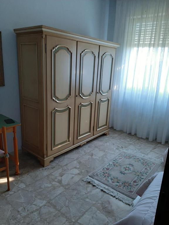 A bed or beds in a room at Villa Paulette