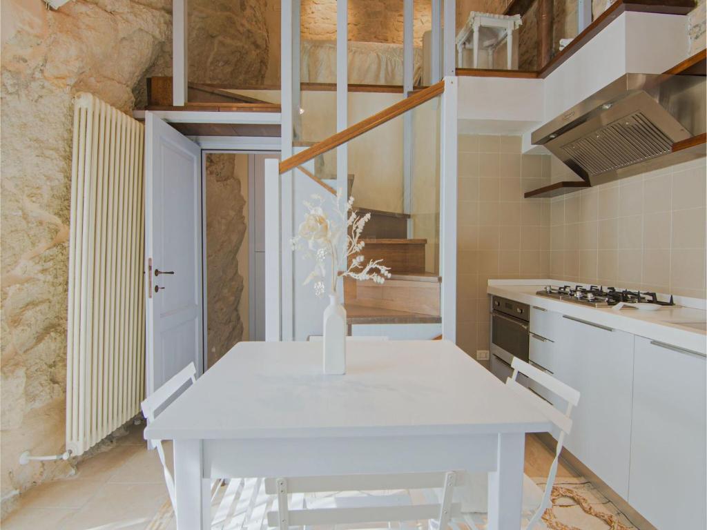 A kitchen or kitchenette at Apartment in Petrella Guidi with Medieval Charm