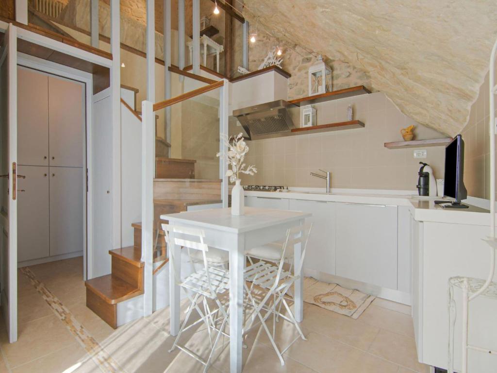 A kitchen or kitchenette at Apartment in Petrella Guidi with Medieval Charm