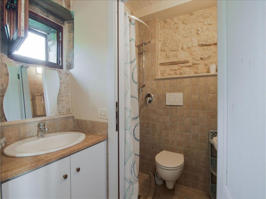 A bathroom at Apartment in Petrella Guidi with Medieval Charm