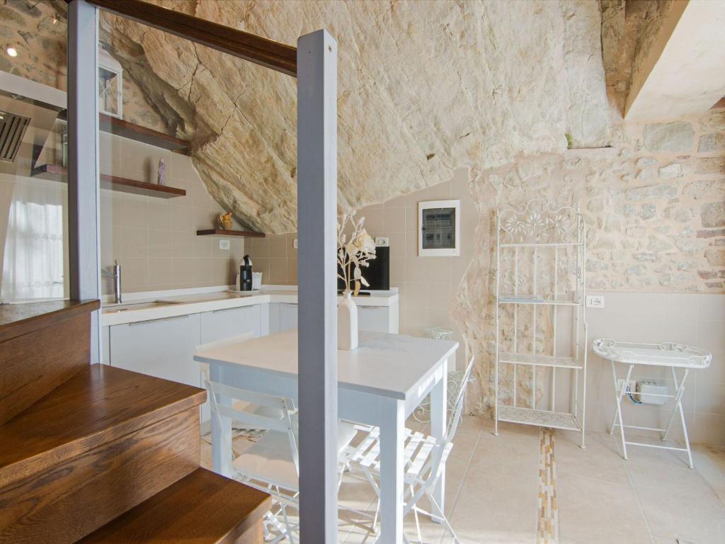 A kitchen or kitchenette at Apartment in Petrella Guidi with Medieval Charm