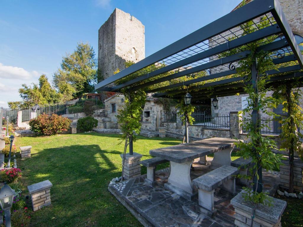A garden outside Apartment in Petrella Guidi with Medieval Charm