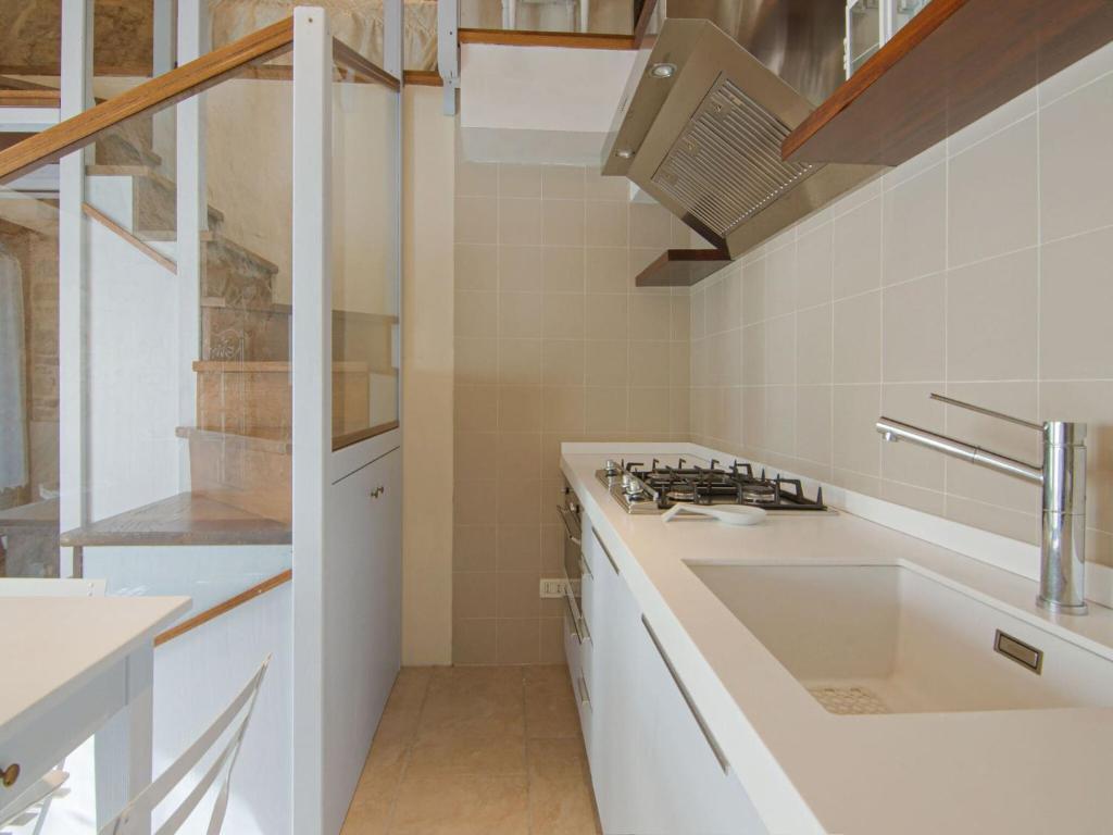 A kitchen or kitchenette at Apartment in Petrella Guidi with Medieval Charm