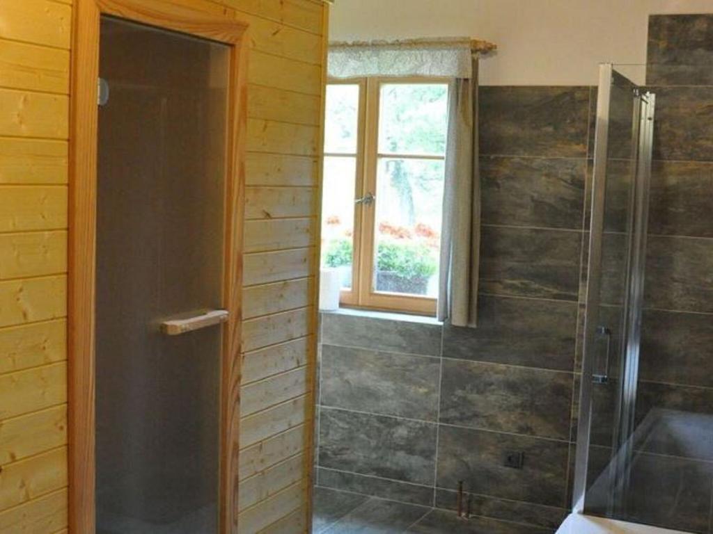 Koupelna v ubytování Spacious Holiday Home in Dlouhý with Sauna