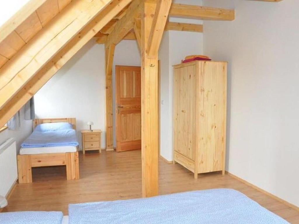 Postel nebo postele na pokoji v ubytování Spacious Holiday Home in Dlouhý with Sauna