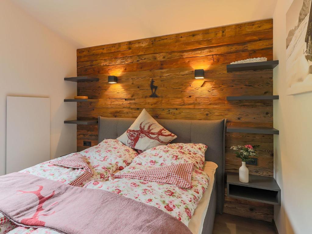 A bed or beds in a room at Apartment in Tyrol near ski area