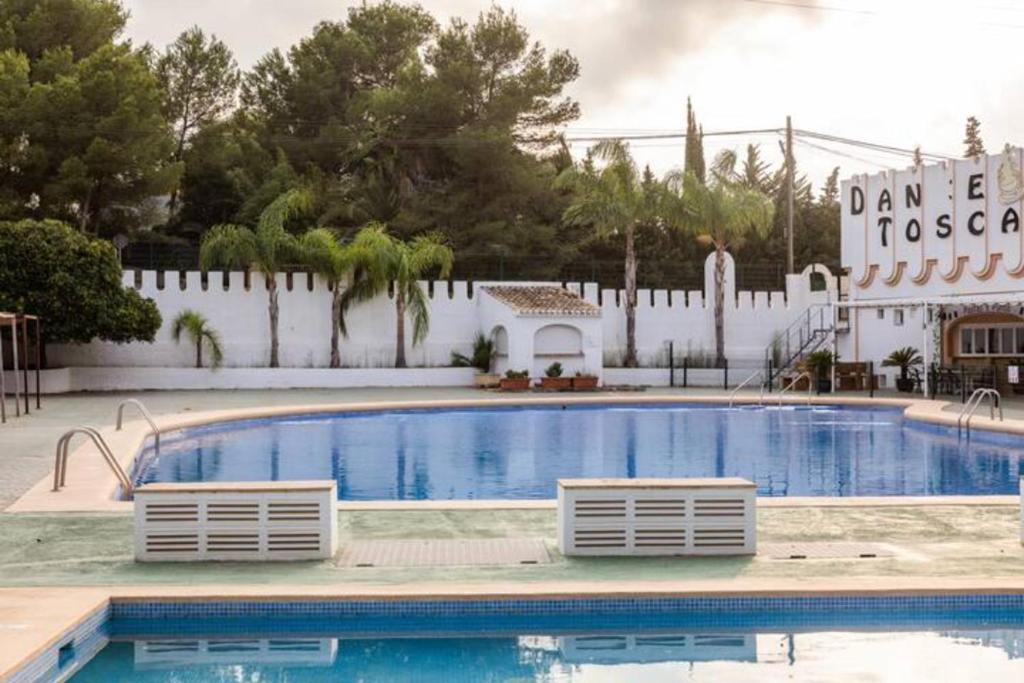 Bazén v ubytovaní Cala Blanca Javea/Residence, beach, pool, tenis A/C alebo v jeho blízkosti
