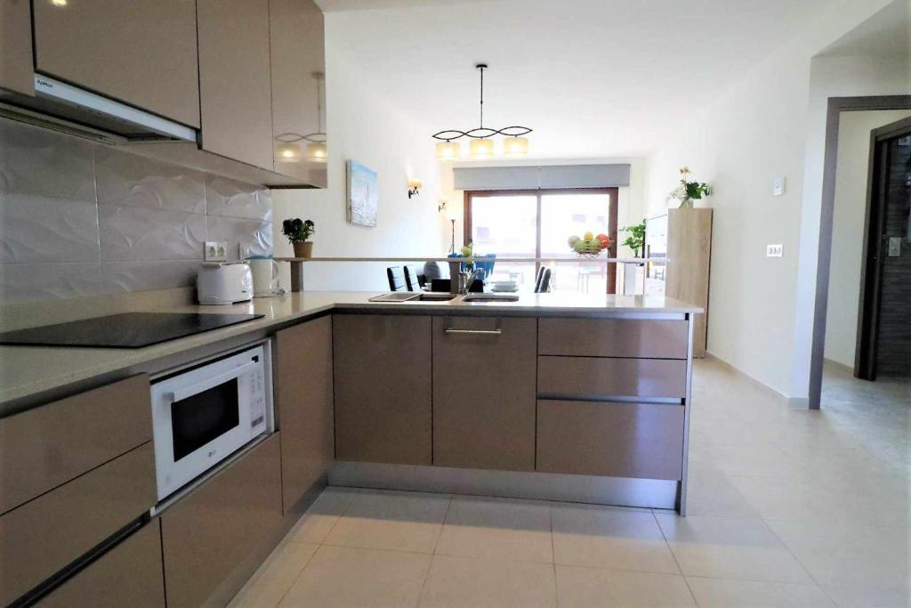 Zdjęcie z galerii obiektu Casa Azucena apartamento cerca de la playa con piscina comunitaria w mieście San Juan de los Terreros