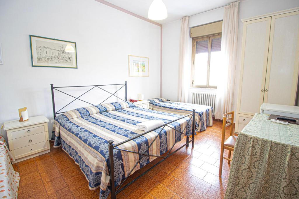 Postel nebo postele na pokoji v ubytování Hotel PRime