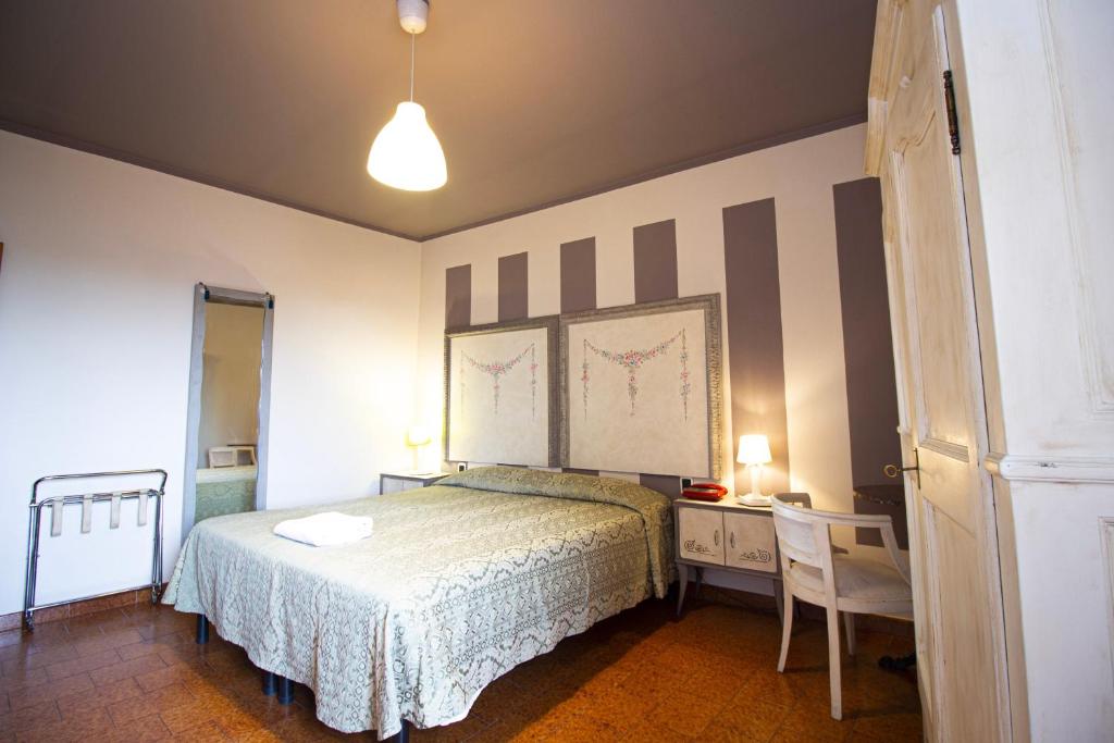 Postel nebo postele na pokoji v ubytování Hotel PRime