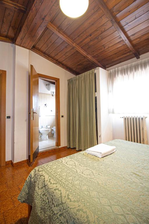 Postel nebo postele na pokoji v ubytování Hotel PRime