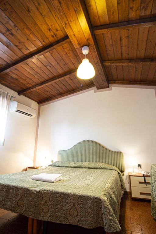 Postel nebo postele na pokoji v ubytování Hotel PRime