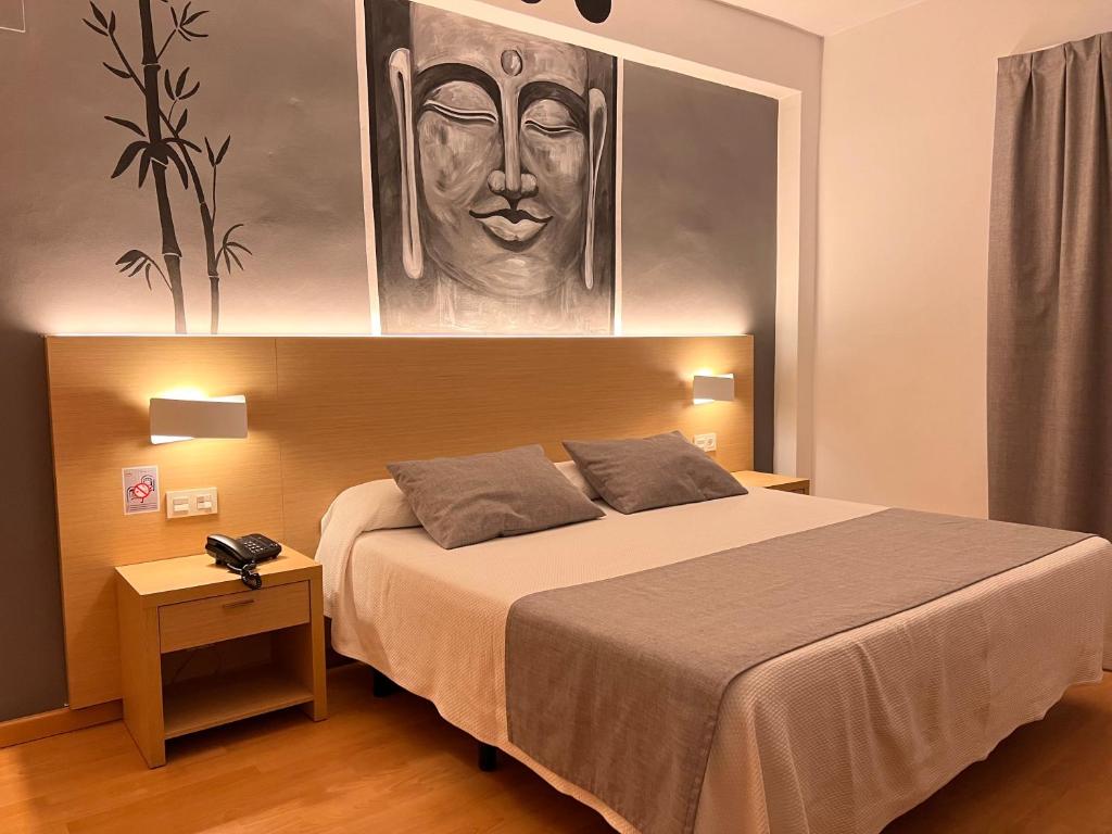 Postel nebo postele na pokoji v ubytování Hotel Golden