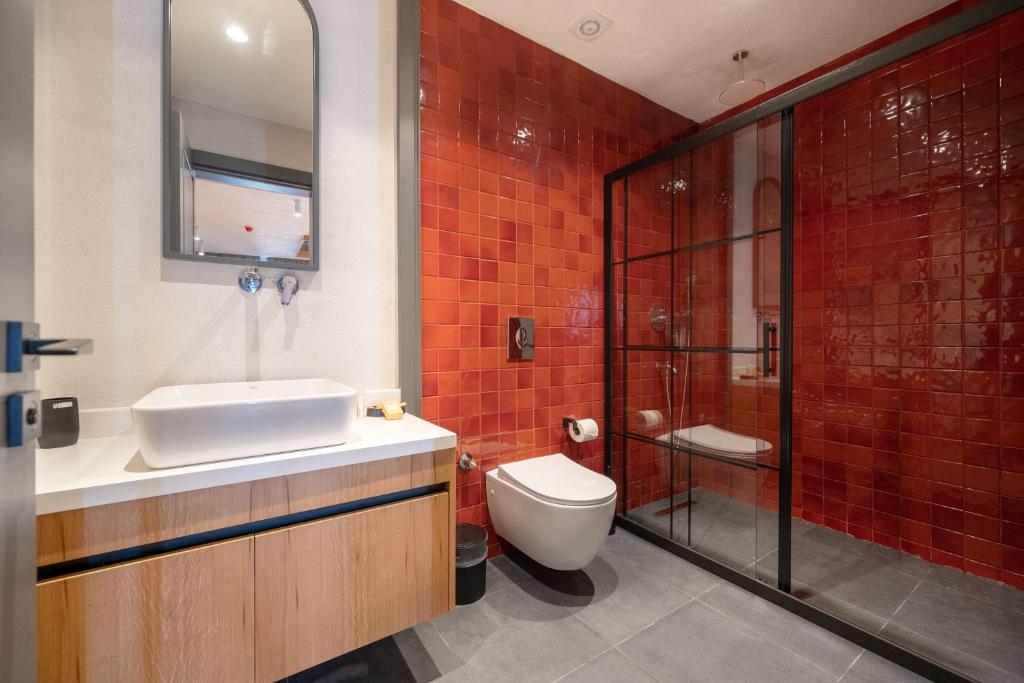 Koupelna v ubytování Reddoors Suites Sea View