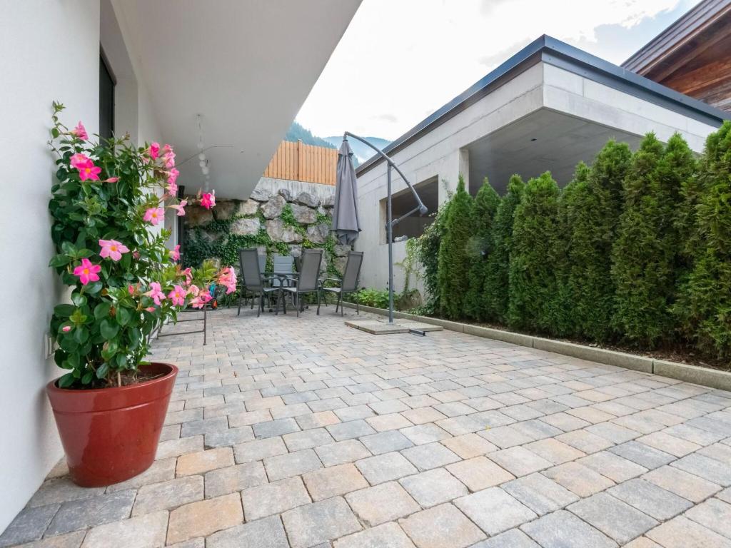 Vonkajšia záhrada v ubytovaní Apartment in Tyrol near Ski Lift