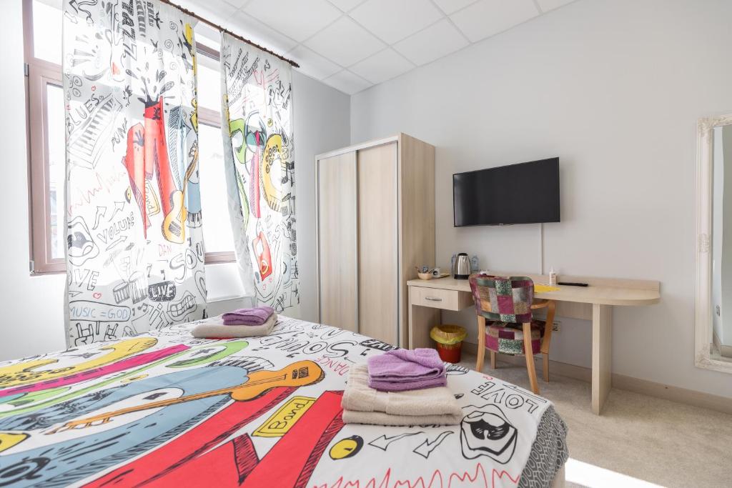 Postel nebo postele na pokoji v ubytování SMART