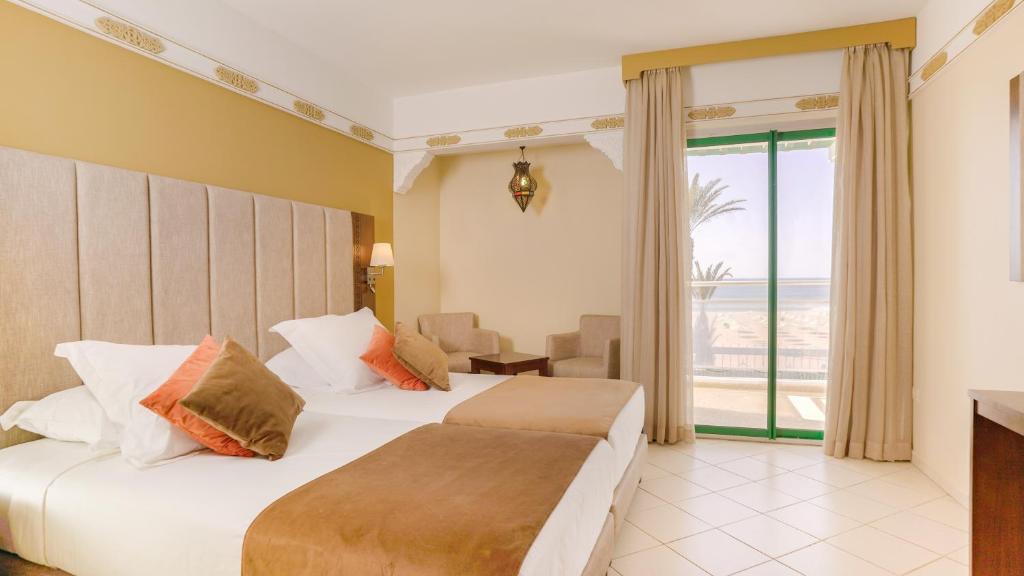 Postel nebo postele na pokoji v ubytování Agadir Beach Club