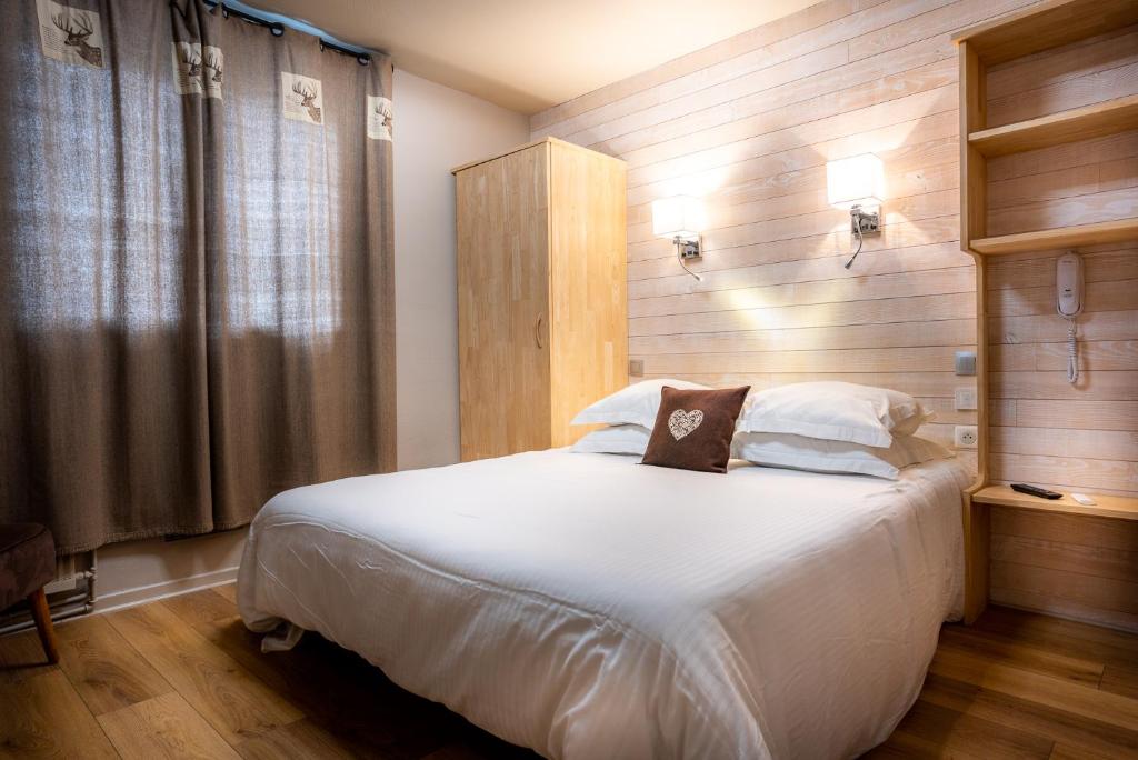Postel nebo postele na pokoji v ubytování Hôtel La Rencluse