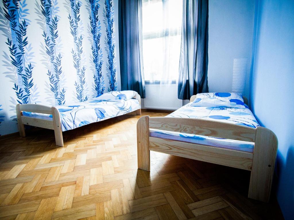 Postel nebo postele na pokoji v ubytování Hostel 4you