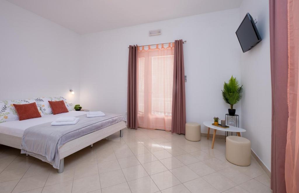 Posteľ alebo postele v izbe v ubytovaní Studio Apartment Brigita