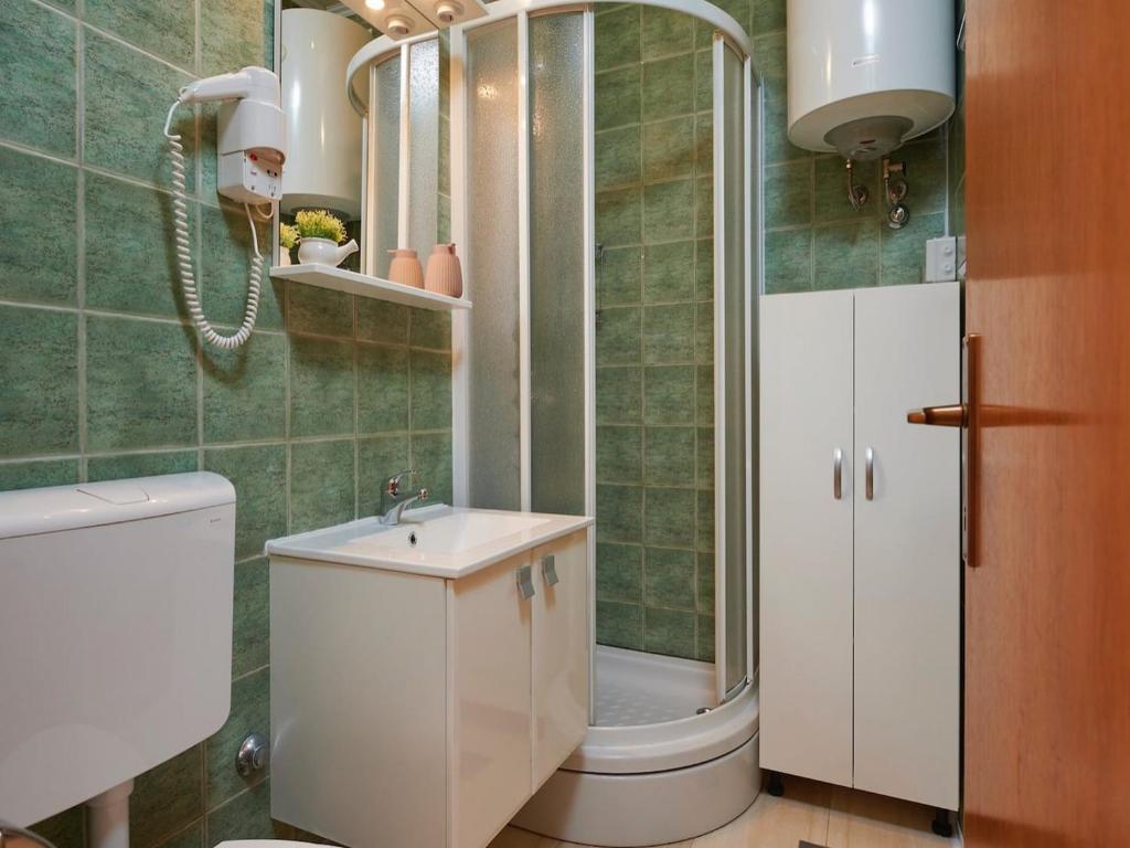 Koupelna v ubytování Apartments Vujina