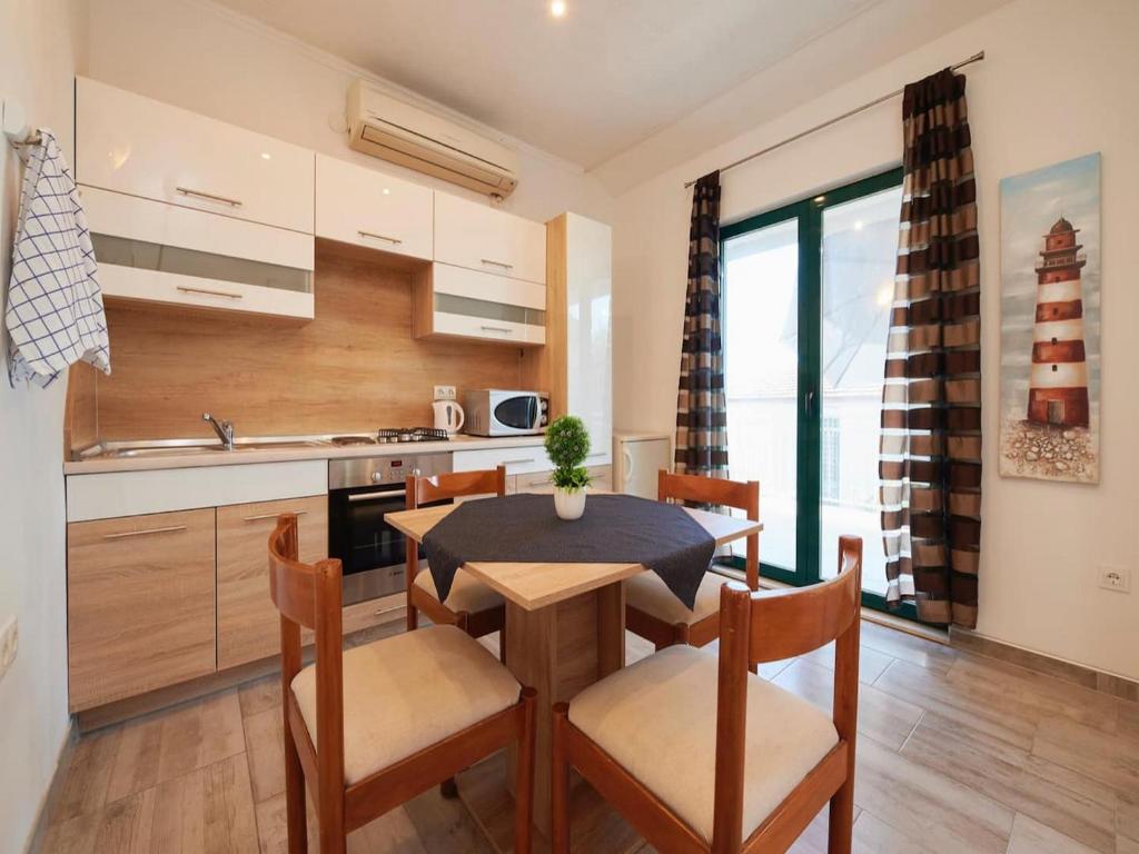 Kuchyň nebo kuchyňský kout v ubytování Apartments Vujina