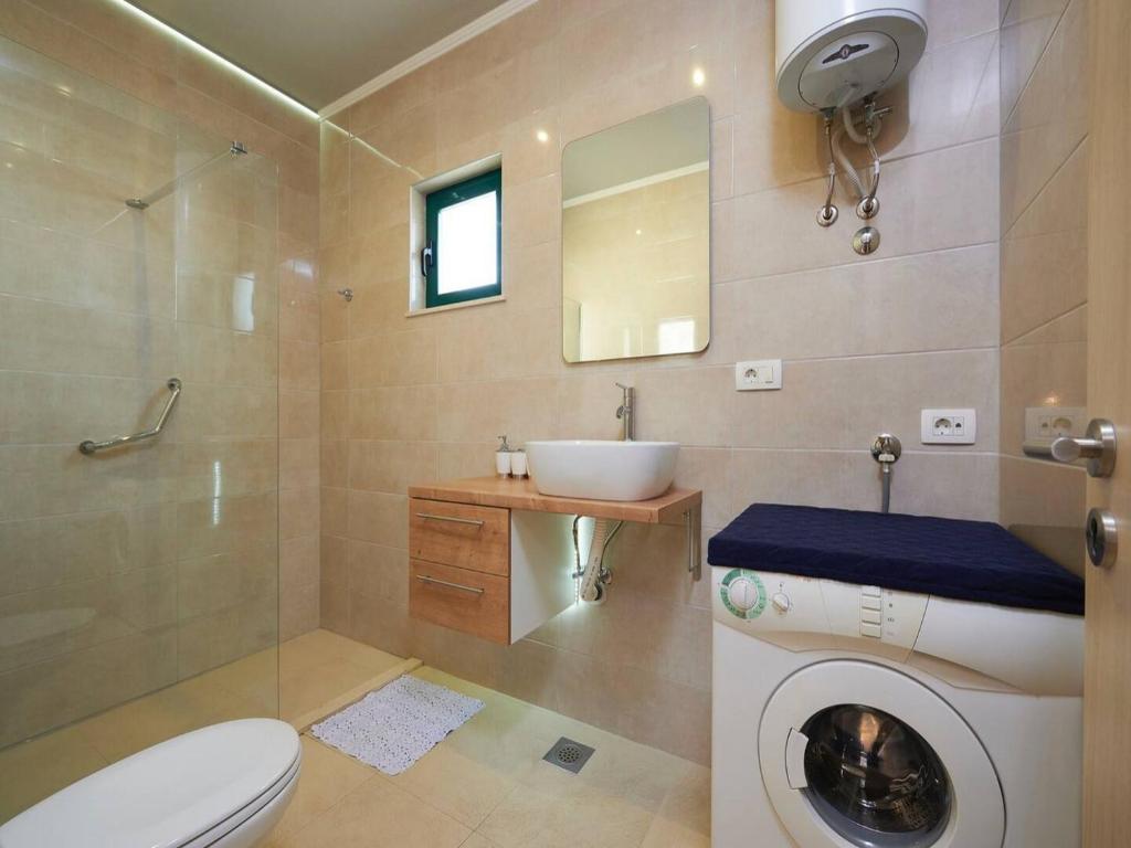 Koupelna v ubytování Apartments Vujina